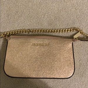 Michael Kors rose gold hand bag